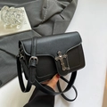 Chic black litchi leather crossbody bag with silver cross hardware and chain detail - Black