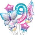 Macro detail of the gradient butterfly and number 9 foil balloon set for birthday decor - Number 9