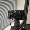 Detail view of stylish black sequin underarm bag with delicate double shoulder straps - Black