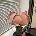 Pink crossbody bag with pleated texture, drawstring accents and silver chain strap - Pink