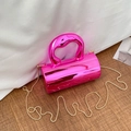 Modern electroplated fuchsia acrylic cylinder box bag with bold curved handle and gold chain - Pink
