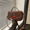 Retro brown crossbody square bag with a cherry charm and minimalist matte leather finish - Brown
