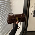 French retro glossy dark brown underarm bag with elegant gold cylindrical metal lock - Brown