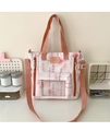 Dettaglio della borsa tote in tela rosa con calligrafia tradizionale e tasca anteriore - Rosa