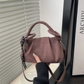 Brown suede shoulder bag with knotted handle, heart charm and pleated vintage design - With Pendant / Brown