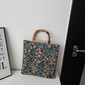 Vintage floral embroidery tote bag with natural bamboo handles and spacious design - Black