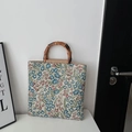Retro linen floral handbag with natural bamboo handles and textured jacquard finish - Blue Flower