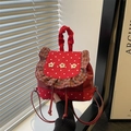 Sac à dos rouge à pois minimaliste avec petites fleurs et détails volantés - Rouge