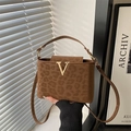 Stylish brown leopard print handbag with a gold V-buckle and adjustable strap - Brown