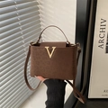 Brown leopard print suede handbag with gold V-buckle and adjustable shoulder strap - Brown