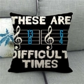 Close-up of linen pillowcase with music notes and These Are Difficult Times quote - Difficult Times Music Style (16) / 45*45cm (No Core)