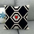 Linen pillowcase with black geometric checkers and a central red heart on a grey sofa - 18x18 Inch / Hexagon with Red Heart (10)