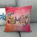 Funda de cojín de lino con diseño artístico de Family sobre un sofá gris acogedor - Family Estilo de Arte Collage