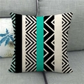 Detail of geometric pattern linen pillowcase on grey sofa for home decoration - Boho Black Cyan (11)