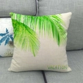 Linen pillow cover with green palm leaf print and Vacation text on a grey sofa - 18x18 Inch / VACATION Green Palm Leaf (2)