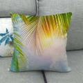 Linen cushion cover with tropical palm leaf print on a gray fabric sofa setup - 18x18 Inch / Yellow and Green Palm Leaf (1)