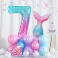 Detail of 7th birthday mermaid balloon set with large number 7 and shell balloon decoration - Number 7