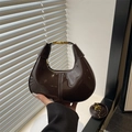 Glossy dark brown patent leather crescent bag with elegant gold metal handle and strap - Brown