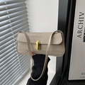 Minimalist beige crocodile embossed baguette bag with golden buckle and sleek shoulder strap - Khaki