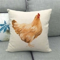 Detail of linen cushion cover featuring watercolor chicken art on a grey fabric sofa - 18x18 Inch / Yellow Hen Style (6)