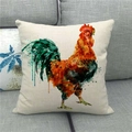 Close-up of watercolor rooster pattern on linen cushion cover atop a dark grey sofa - 18x18 Inch / Splash Ink Art Rooster Style (17)