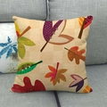 Fall leaves pattern linen throw pillow cover with autumn colors on a grey sofa background - Artistic Multicolor Leaves (4)