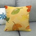 Detail of fall leaves linen pillow cover with text print on a gray fabric sofa - Nordic Modern Leaf Print (5)