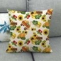 Close-up of linen pillow cover with harvest pumpkin and sunflower prints on gray sofa - Autumn Harvest Vegetables (13)