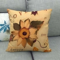 Linen Thanksgiving throw pillow cover with yellow floral pattern on a grey sofa - Retro Artistic Floral (14)