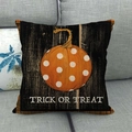Detail of Halloween pumpkin linen pillowcase on sofa with Trick or Treat typography - Polka Dot Pumpkin Trick Or Treat Style (11)