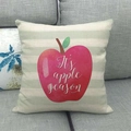 Detail of linen cushion cover with stripes and red apple print and apple season text - Striped Apple Season (11)