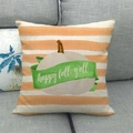 Detail of fall pumpkin linen pillow cover with happy fall text on a grey sofa - Happy Fall Y'all (10)