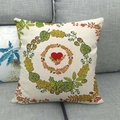 Detailed texture of autumn wreath linen pillow cover on a grey fabric sofa - Heart Autumn Elements Wreath Style (10)