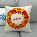 Close-up of linen cushion with autumn leaf wreath and printed artistic Autumn text - Falling Leaves Autumn Print Style (11)