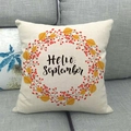 Macro detail of linen pillow case with Hello September text and autumn leaf wreath pattern - Hello September Autumn Wreath Style (14)