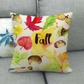 Detail of linen autumn pillow case with fall leaves and mushrooms on a grey sofa - Red Maple Leaf and Small Animals Illustration Fall Style