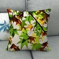 Close-up of rustic linen fabric texture and painted maple leaf print on autumn pillow case - Layered Maple Leaf Style