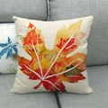 Fall maple leaf painted linen pillow cover on a grey sofa for Thanksgiving decor - Painted Maple Leaf Style