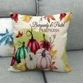 Linen fall pillow cover with burgundy and pastel pumpkins design on gray sofa - 18x18 Inch / Burgundy & Pastel PUMPKINS