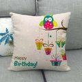 Linen cushion cover with a colorful cartoon owl and Happy Birthday text on a sofa - Happy Birthday Owl Branches (2) / 45x45cm