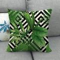 Detail of linen pillowcase with tropical green leaves and black stripes on a sofa - 18x18 Inch / Black White Striped Plant (5)