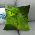 Macro detail of tropical green monstera leaf pattern on durable linen throw pillow cover - Realistic Palm Leaf Print (7)