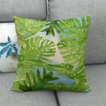 Linen pillow cover with tropical green monstera leaf patterns on a grey sofa - 18x18 Inch / Tropical Foliage Pattern (1)