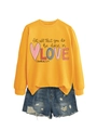 Close-up of yellow sweatshirt with heart and quote paired with distressed denim shorts - Yellow Sweatshirt (Black Text Pattern)