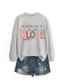 Flat lay of gray long sleeve sweatshirt with printed quote and distressed denim shorts - Grey Sweatshirt (Black Text Pattern)