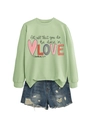 Flat lay of light green sweatshirt with 'Let all that you do be done in LOVE' text print - Olive Green Sweatshirt (Black Text Pattern)