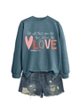 Detail of greyish blue sweatshirt with Bible verse print and distressed denim shorts - Blue Sweatshirt (White Text Pattern)