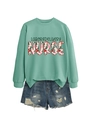 Close-up of mint green Labor & Delivery Nurse sweatshirt with floral typography and denim shorts - Light Green