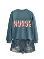 Detail view of Labor & Delivery Nurse sweatshirt with floral texture and denim shorts - Blue