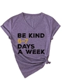 Detail of purple V-neck T-shirt showing folded sleeves and BE KIND graphic slogan - Purple (Black Graphics)